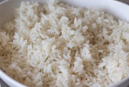 White Rice · Boiled white rice served with stew.