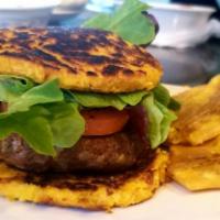 Cachapa Burger · Original cachapa in a burger style with a side of salad.
