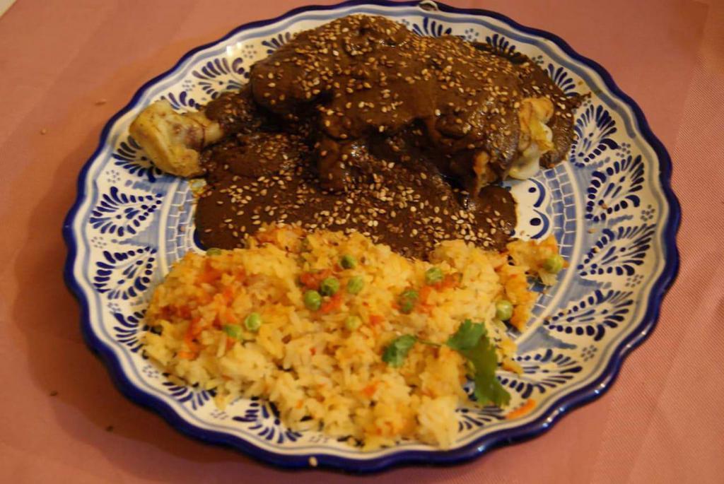 Mole Naolinco · Served with a side of rice. Traditional Mexican mole chicken or tofu). Contains nuts.