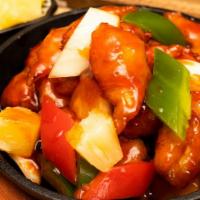 9. Wok Fired Sweet & Sour Chicken · Chicken, sweet and sour sauce, pineapple, onion, bell peppers.