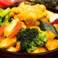 10. Wok Fired Yellow Curry Chicken · Chicken, yellow curry sauce, zucchini, broccoli, bell peppers, onion.
