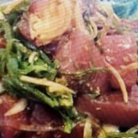 Ahi Poke Appetizer · Maguro and tako with thinly sliced onions, seaweed salad, light soy dressing, green onions, ...