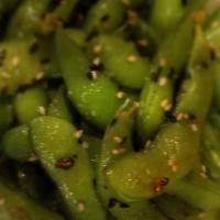 Sesame Garlic Edamame · Boiled soy beans tossed with our special sesame garlic butter.