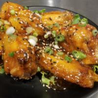 Aloha Sweet Chili Wings · Wings tossed in Sweet Chili Sauce.