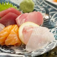10 piece Sashimi  · Ten pieces of assorted sashimi