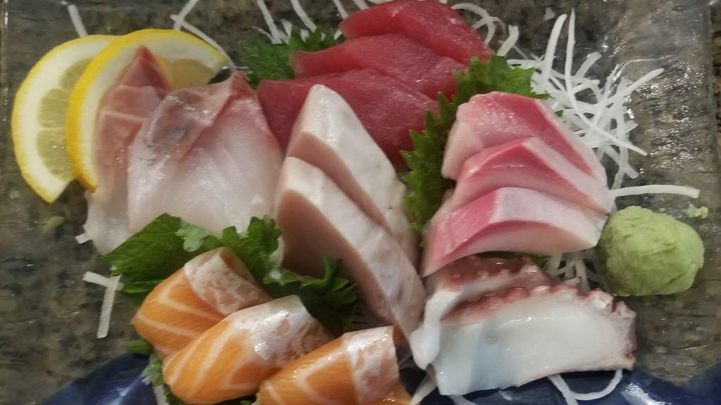 Sashimi Moriawase Entree · 15 pieces of assorted sashimi. Served with soup and salad.