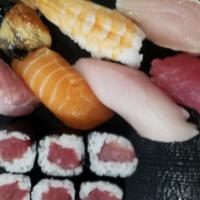 Nigiri Special · Seven pieces of assorted nigiri and six pieces of tekka maki. Served with soup and salad.