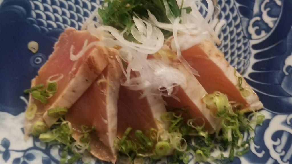 Albacore Tataki · Five large pieces of white tuna with onions and ponzu sauce.