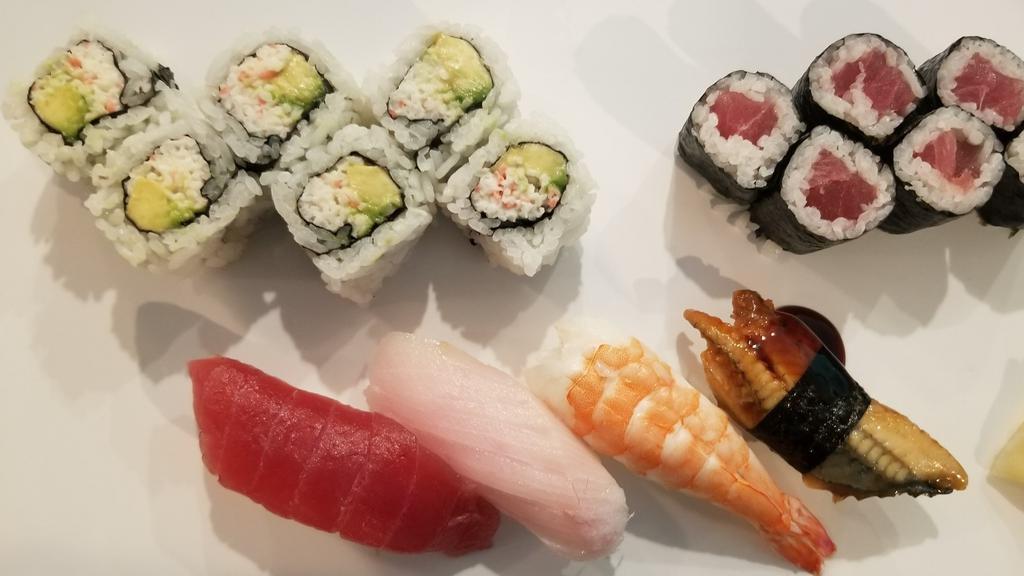Sushi Special · Four pieces of assorted nigiri, six pieces of California roll and six pieces of tekka maki. Served with soup and salad.