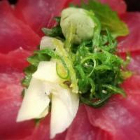 Tekka Donburi · Ahi Tuna sashimi over sushi rice. Served with soup and salad.