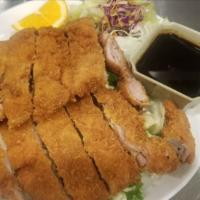Chicken Katsu · Breaded and fried chicken cutlet.