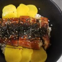 Unagi Donburi · Grilled eel with a teriyaki glaze over rice.