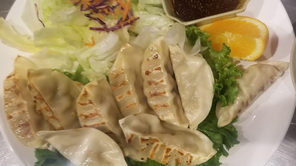 Gyoza Dinner · Japanese style pot stickers. Pork and vegetable or vegetable only.