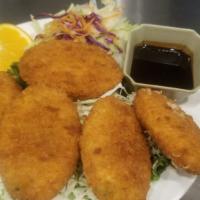 Vegetable Croquette · Breaded patties of potato, corn, and carrots.