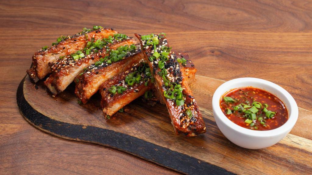 Gochujang Ribs by Mac 'n Cue · By Mac 'n Cue by International Smoke. 5 Smoked St. Louis Cut Ribs. Featuring our house BBQ spice rub and Korean Gochujang Glaze. Contains sesame and soy. We cannot make substitutions.