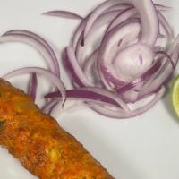 Chicken Sheesh Kabbab - · Grounded chicken marinated in fresh herbs and exotic spices cooked in tandoori oven and serv...