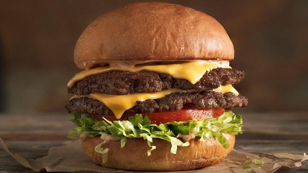 The Mdc · Half pound of fresh, never-frozen Certified Angus Beef®, American Cheese, Lettuce, Tomato, MOOYAH Sauce, Potato Bun