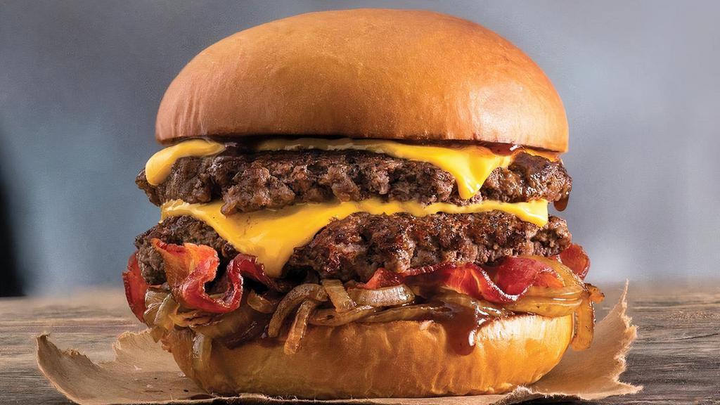 The A-Wonderful · Half pound of fresh, never-frozen Certified Angus Beef®, American Cheese, Bacon, Grilled Onions, A.1.® Sauce, Potato Bun