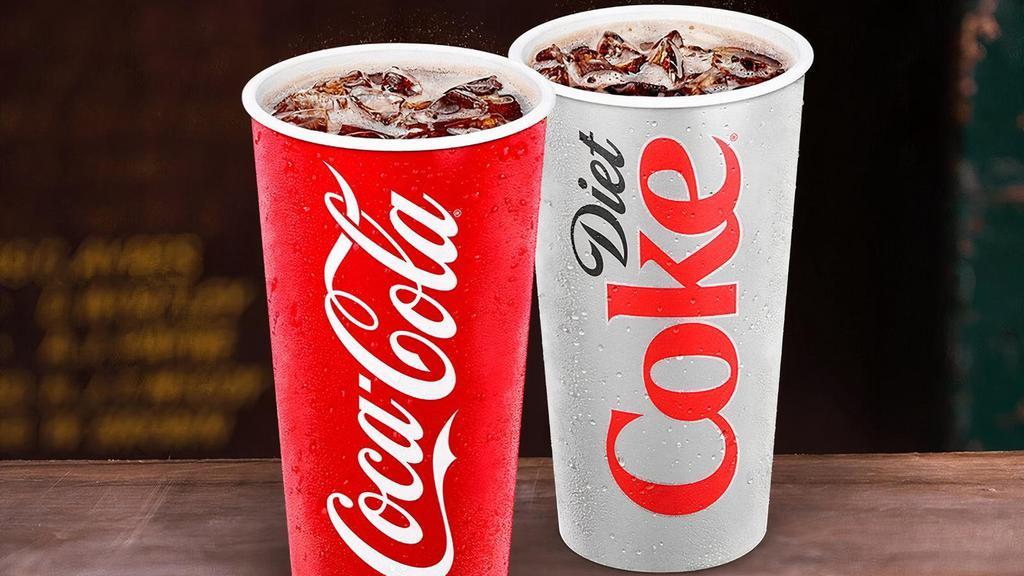 Regular Soft Drink (20 Oz.) · We serve Coca-Cola® products