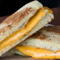 Grilled Cheese (Sandwich Only) · Melted American Cheese on Potato Bun