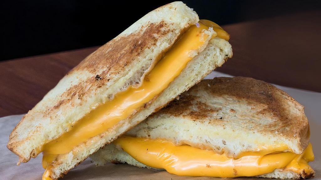 Grilled Cheese (Sandwich Only) · Melted American Cheese on Potato Bun
