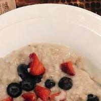 Oatmeal · Made with Straus Whole Milk and topped with marinated dried fruit and brown sugar