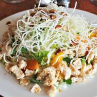 Chinese Chicken Salad · with Napa Cabbage, Cilantro, Cara Cara Oranges, Almonds, Snap Peas, Crispy Rice Noodles and ...