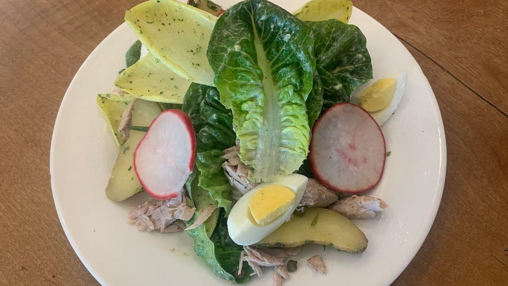 Ahi Tuna Salad · Tuna Two ways: Poached Ahi Tuna and Ahi Tuna Tartare with Baby Gem Lettuce and Belgian Endive served with Chilled Herbed Fingerling Potatoes, Hard Boiled Egg, Capers, Chives and Pickled Radish with Green Goddess Dressing