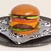Mantra Burger · This is one foxy burger. Impossible burger, cheddar, lettuce, tomato, onion, avocado, carame...
