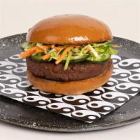 Yin Burger · Can you dig it? Impossible burger, shredded cabbage slaw, sliced jalapenos, cucumber, cilant...