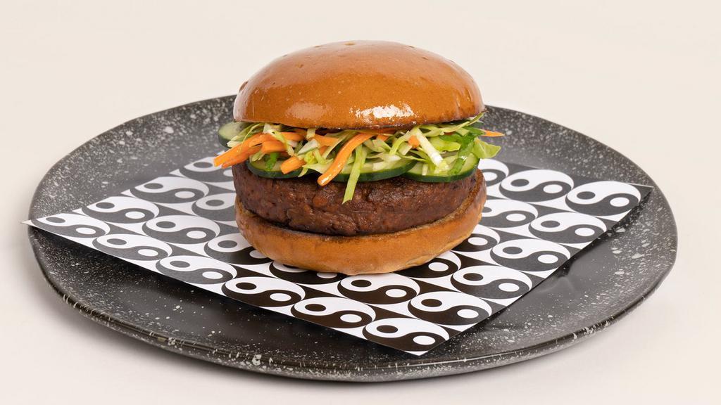 Yin Burger · Can you dig it? Impossible burger, shredded carrot slaw, sliced jalapenos, cucumber, cilantro, sriracha mayo.