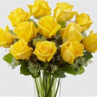 Dozen Yellow Rose Arrangement · 12 Long stem YELLOW roses beautifully arranged with foliage in a clear glass vase