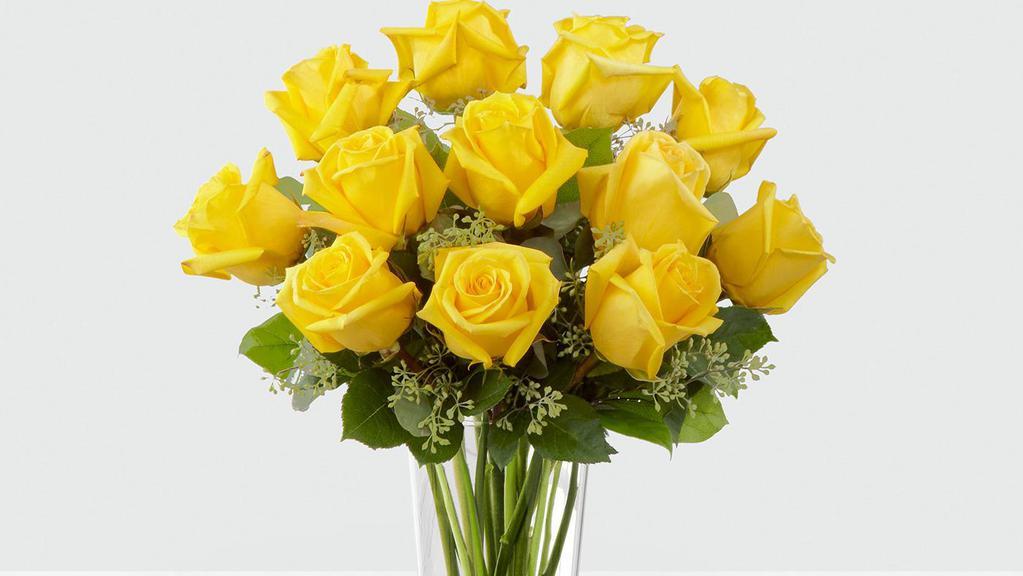Dozen Yellow Rose Arrangement · 12 Long stem YELLOW roses beautifully arranged with foliage in a clear glass vase