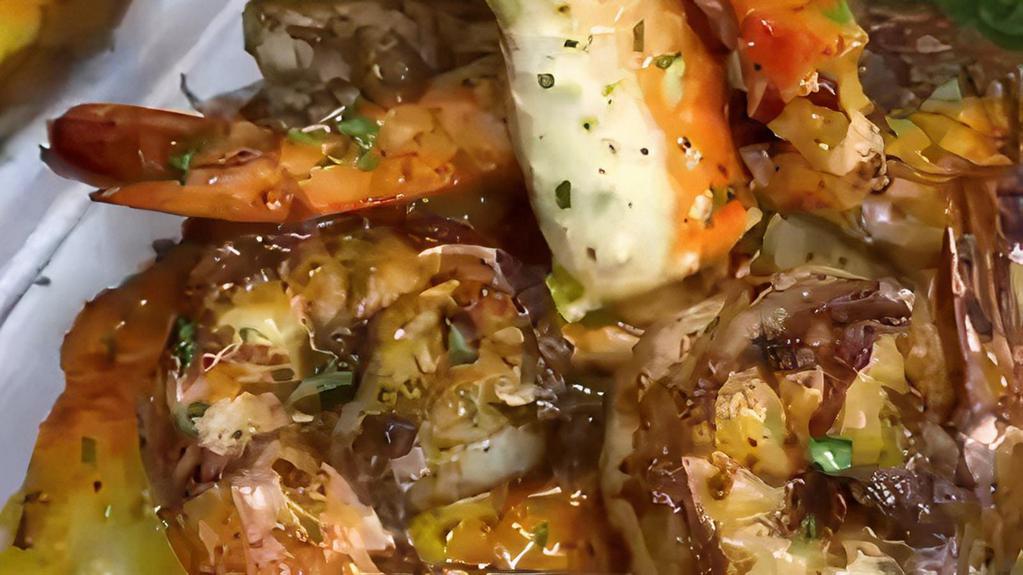 Seafood bake potato · Seafood bake potato- garnished with shrimps 
crab legs an amazing seafood sauce-