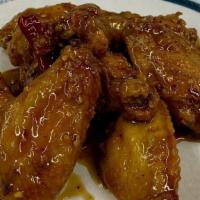 E3 .Dry Braised Chicken Wings · Spicy.