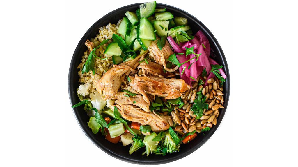 Chicken Hearty Bowl · base of millet & rice + juicy slow roasted chicken, cauliflower, broccoli, carrots, roasted sunflower seeds, pickled red onions, fresh cucumber, parsley garnish, & signature sauce // gluten, soy, dairy free // zero refined sugar
