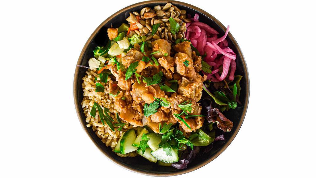 Chickpea & Potato Mixed Bowl · base of greens & grains + slow roasted organic chickpeas & potatoes, cauliflower, broccoli, carrots, roasted sunflower seeds, pickled red onions, fresh cucumber, parsley garnish, & signature sauce // gluten, soy, dairy free // 100% plant based