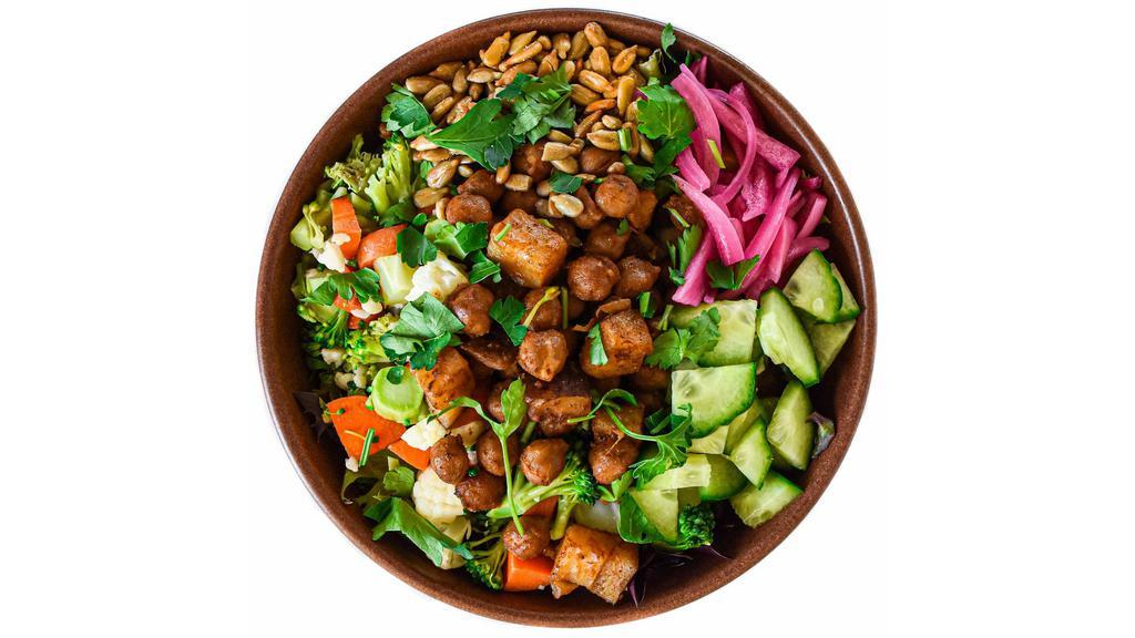 Chickpea & Potato Garden Bowl · base of fresh spring mix + slow roasted organic chickpeas & potatoes, cauliflower, broccoli, carrots, roasted sunflower seeds, pickled red onions, fresh cucumber, parsley garnish, & signature sauce // gluten, soy, dairy free // 100% plant based