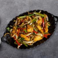 Garlic Pepper Chicken · Sliced chicken sauteed with fresh garlic, mushrooms, green onion, carrot, peppers, and onion.