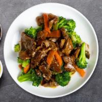 Broccoli Beef · Sliced beef and broccoli sauteed in our special mild sauce, fresh chopped garlic, and carrot...