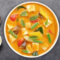 Yellow Curry · (Spicy) Sliced meat cooked in yellow curry paste, coconut milk, carrot, onion, and potatoes.