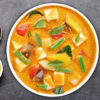 Massamun Curry · (Spicy) Tender cubed beef in red curry, coconut milk, potatoes, onions, and peanut.