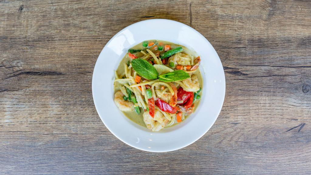 Green Curry Shrimps · Shrimps, red bell pepper, onion, bamboo shoots, string beans,  chickpea, eggplant, cooked with green curry paste.