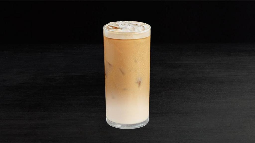 Honey Cold Brew Oat Latte · Golden honey syrup in creamy oat milk lightens up deep, dark cold brew, poured over ice for a chill summertime treat.