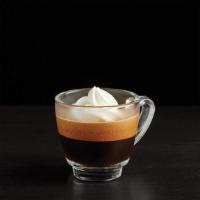 Caffe Con Panna · Some days call for a little indulgence. This rich espresso shot topped with lush whipped cre...