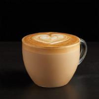 Traditional Cappuccino · A single, perfectly extracted shot of espresso is marbled with freshly steamed milk to creat...