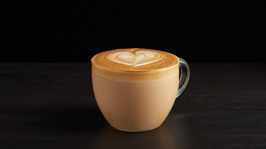 Cappuccino · The essence of handcrafting. Our rich espresso is artfully marbled with freshly micro-foamed milk.