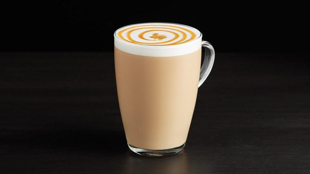 Caramel Macchiato · Rich, buttery caramel, concentrated and intense ristretto shots of espresso, and hint of vanilla.