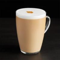 Latte Macchiato · Sweet, concentrated ristretto shots of Espresso Forte are poured through creamy foam into fr...