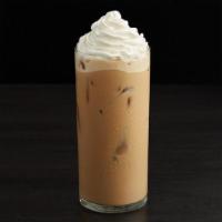 Iced White Chocolate Mocha · Decadent white chocolate sauce blends smoothly with fresh espresso, foam and cold milk for s...